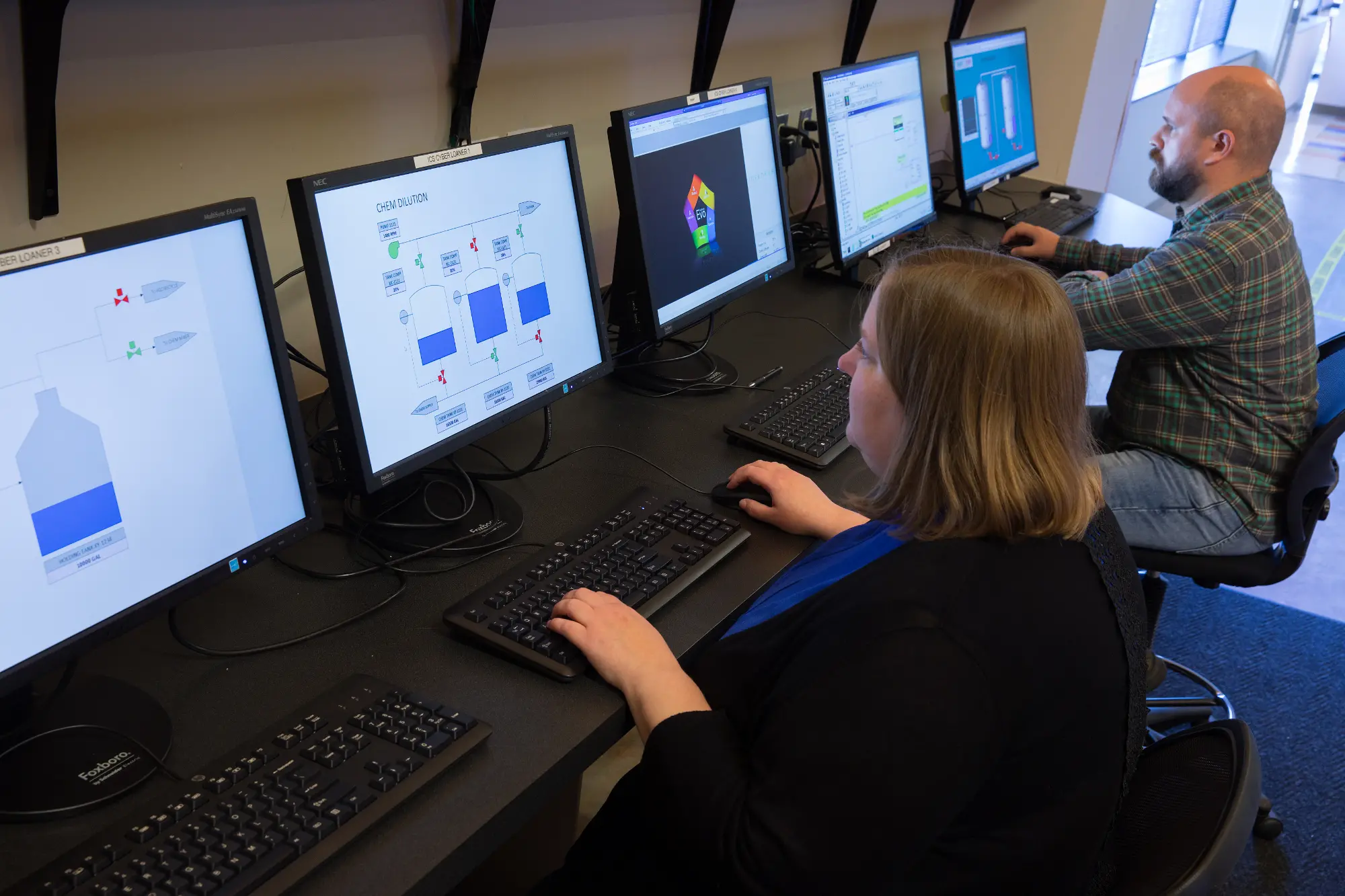 Bechtel Cyber Security Lab, Sterling, Virginia. Demonstrating data readouts for industrial cyber security.